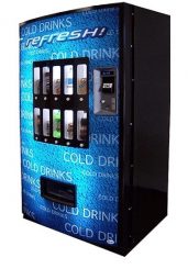 Vendo 721 drink vending machine in a busy warehouse breakroom in Grand Rapids Airport Industrial Area